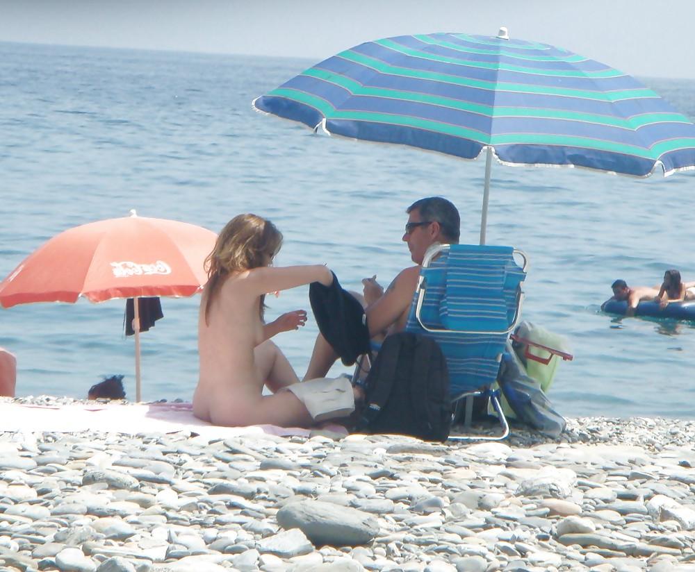 25P Beach undressing 7