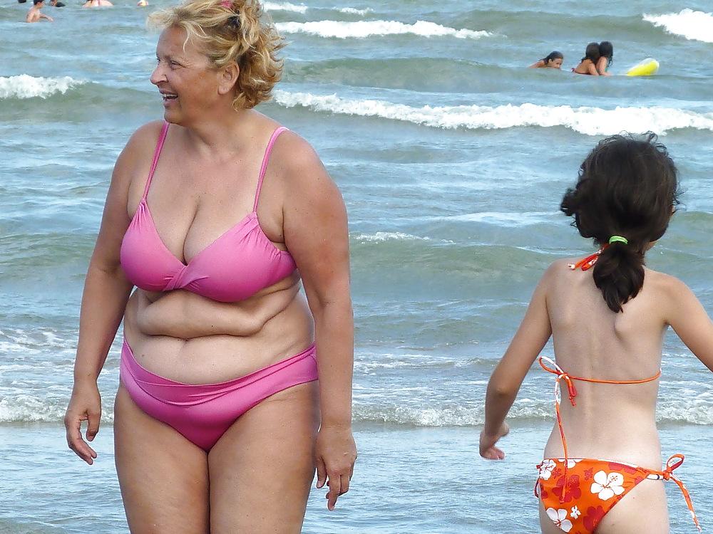 25P Busty granny on the beach! Mixed!