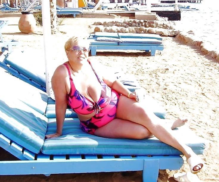 25P Busty granny on the beach! Mixed!