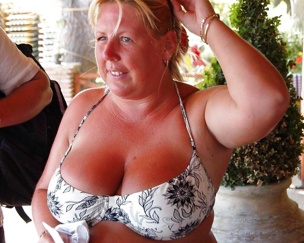 25P Busty granny on the beach! Mixed!
