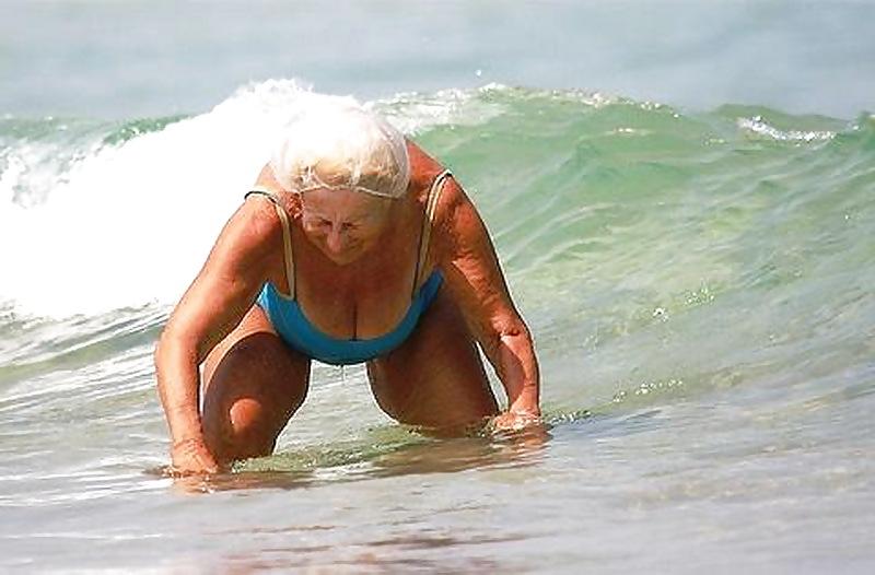25P Busty granny on the beach! Mixed!