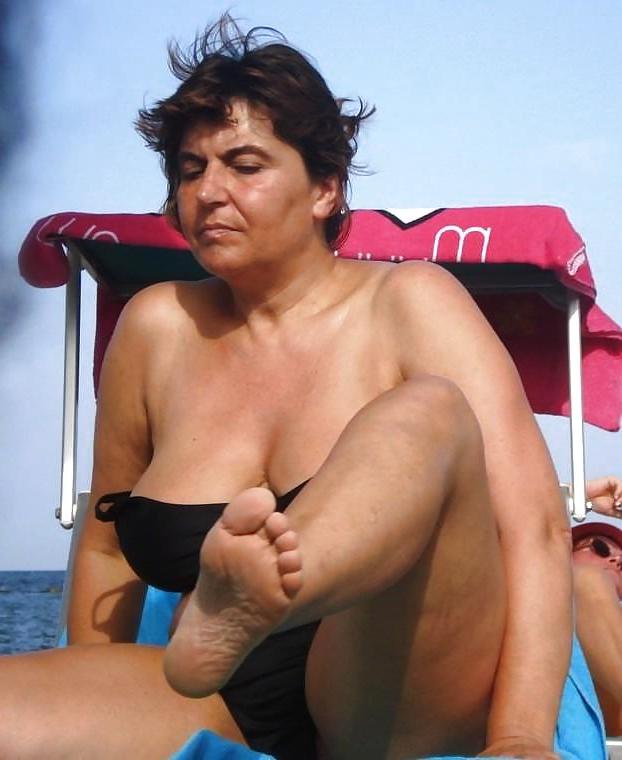 25P Busty granny on the beach! Mixed!