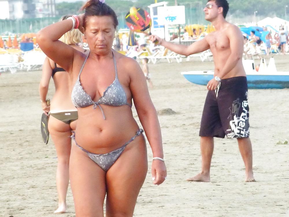 25P Busty granny on the beach! Mixed!