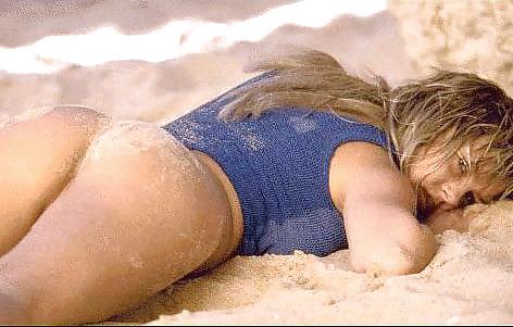 10P Blonde Becky posing on the beach