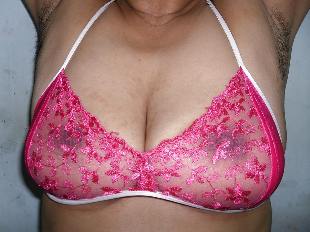 25P Indian milf in net bra and string panty 