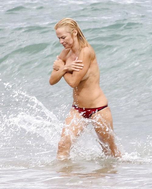11P Pamela Anderson Goes Topless on a Beach in France