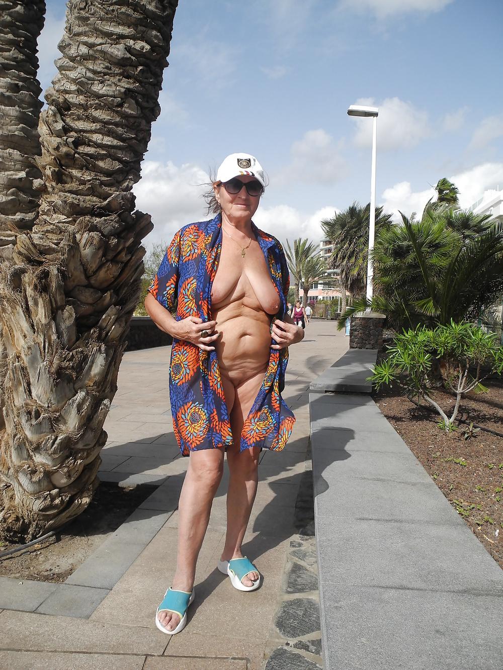 13P Adult woman in the streets of Maspalomas 
