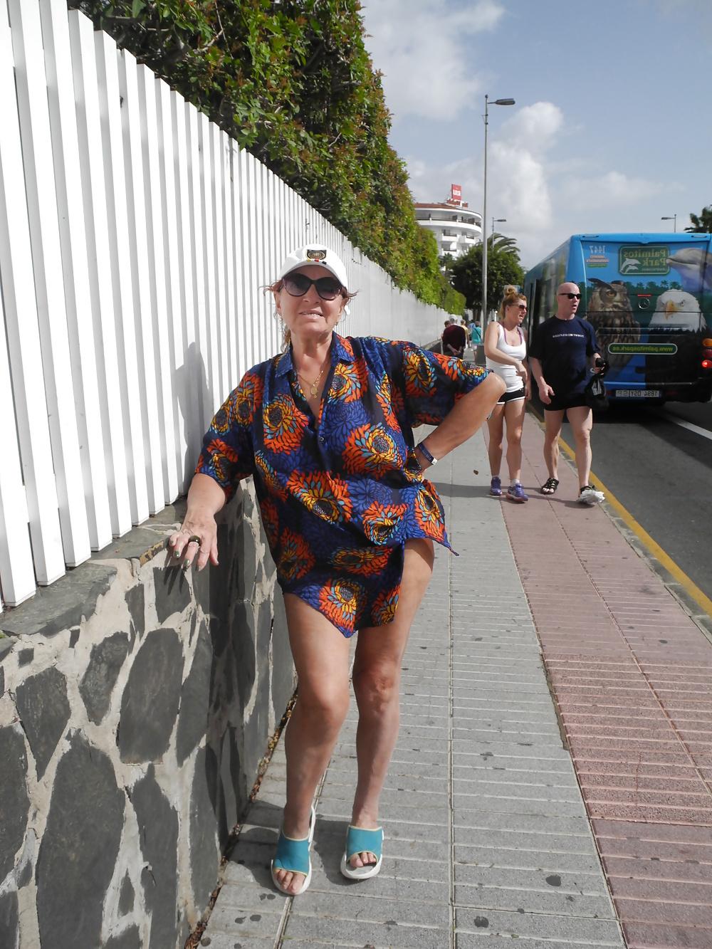 13P Adult woman in the streets of Maspalomas 