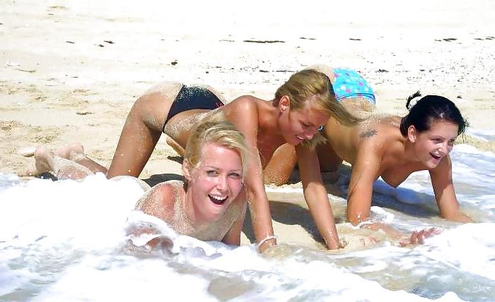 12P Three girls have fun on the beach - N. C. 