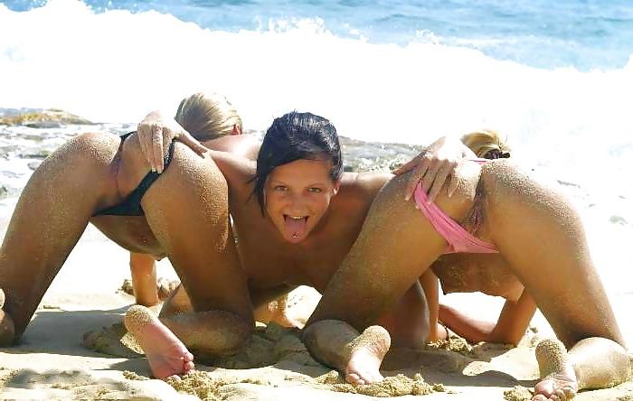 12P Three girls have fun on the beach - N. C. 