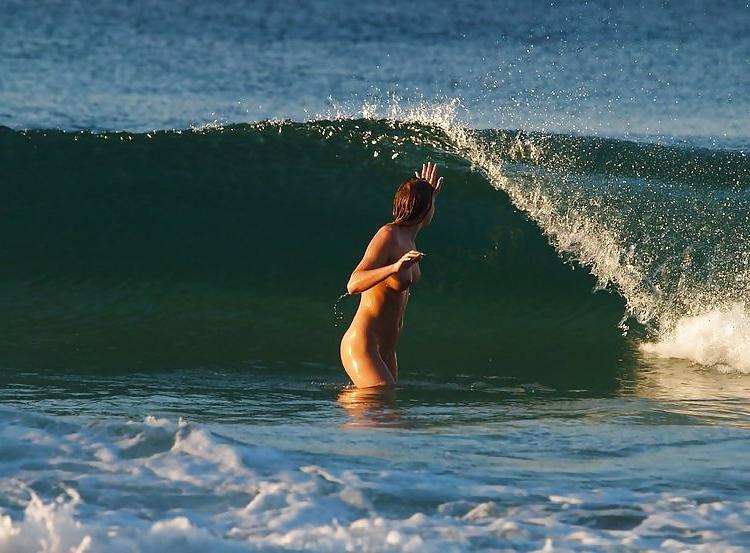 25P Hot sluts nude on the Beach Voyeur