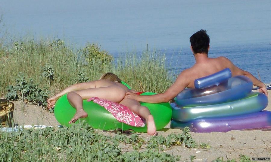 10P Busty MILF on the beach