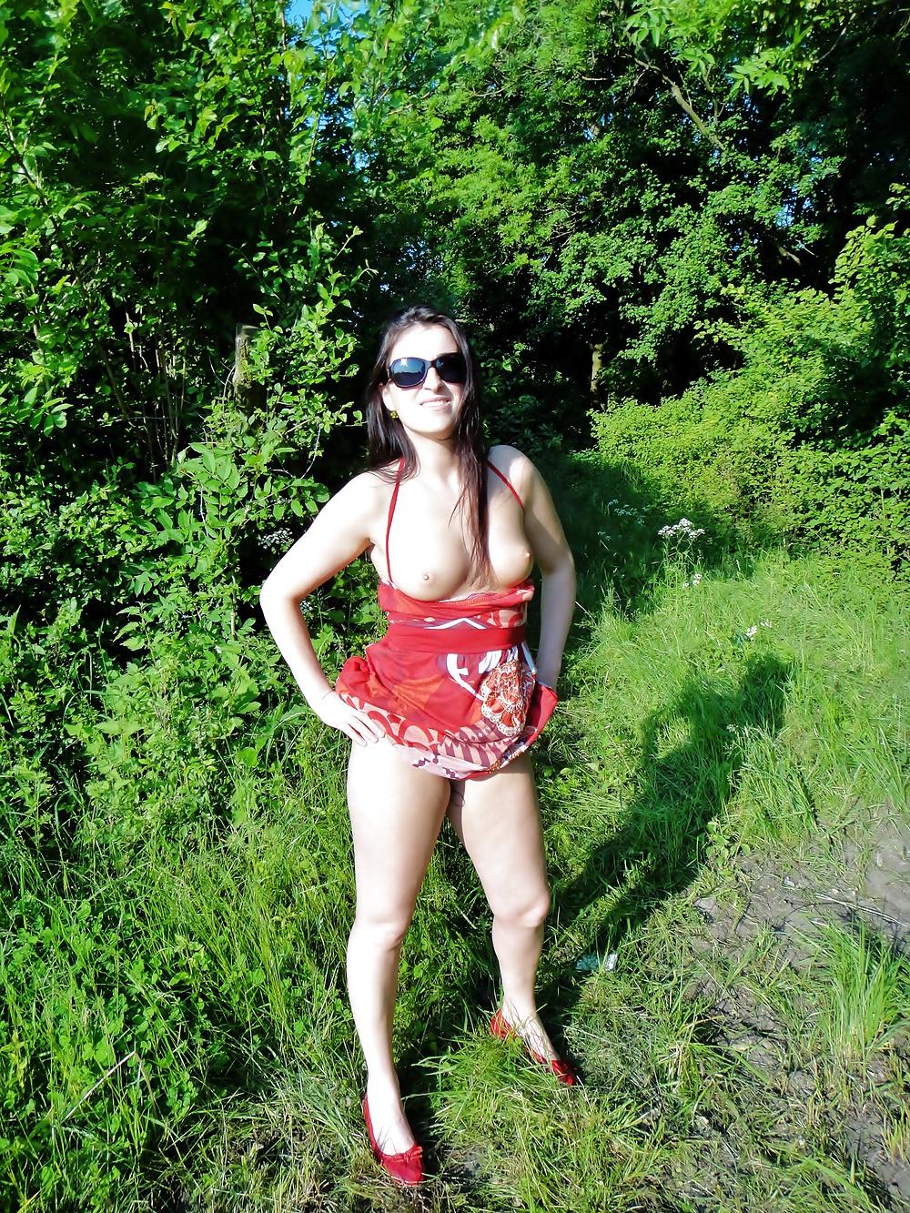 15P SweetSarah outdoor flashing with toy inside her pussy