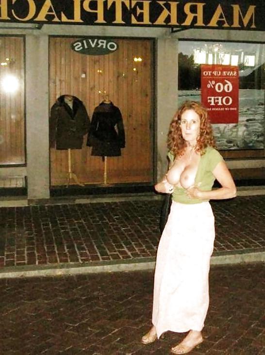 14P Sexy redhead flashing.