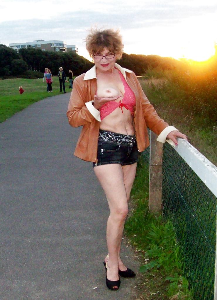 15P Sexy at 60 flashing her tits