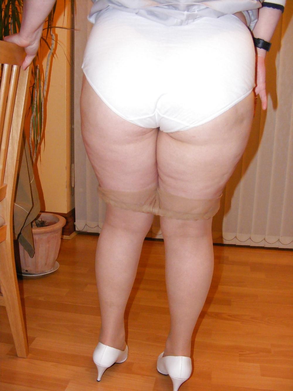 23P Slutty secretary in tights and white stilettos