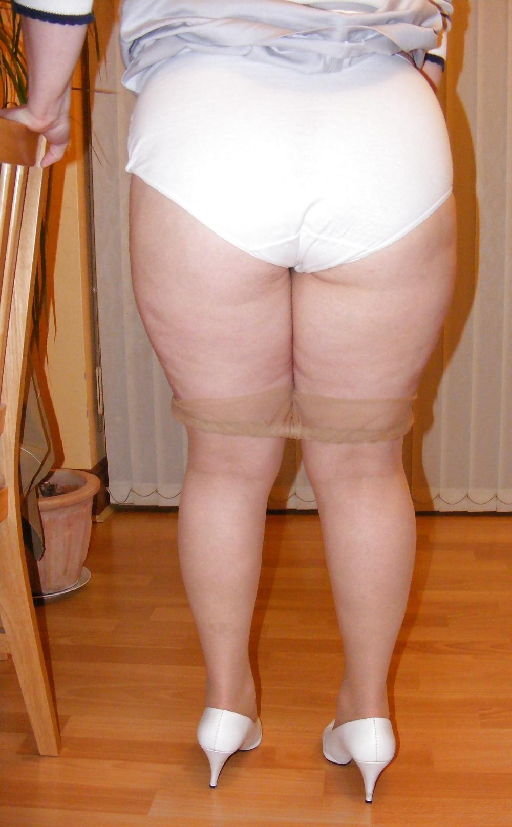 23P Slutty secretary in tights and white stilettos
