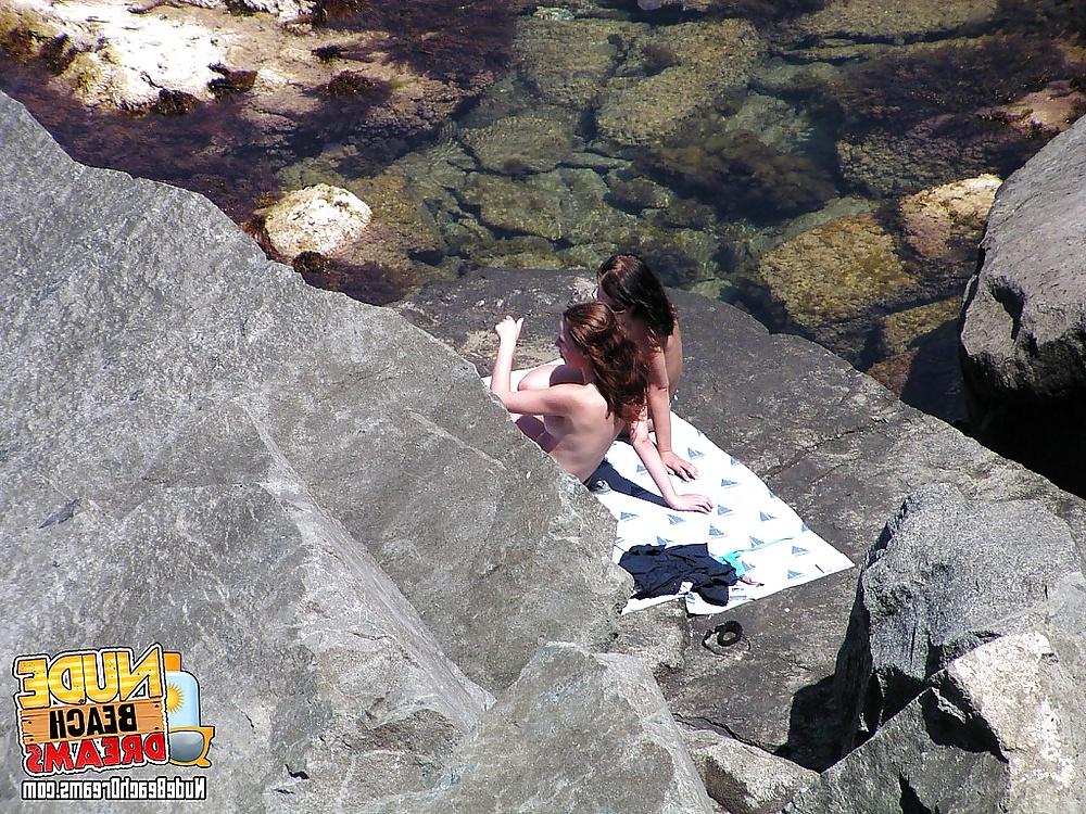 15P Hot babes totally naked at the beach