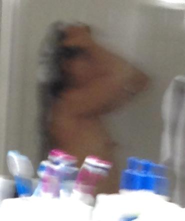 25P Prude Asian MILF undressing b4 shower