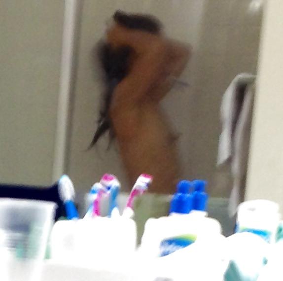 25P Prude Asian MILF undressing b4 shower