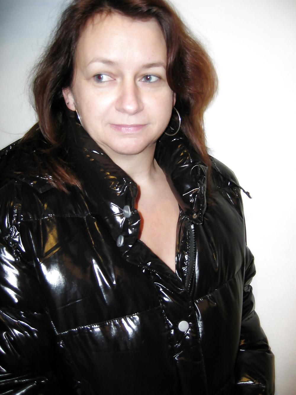 22P Hairy MILF wearing a shiny puffy coat