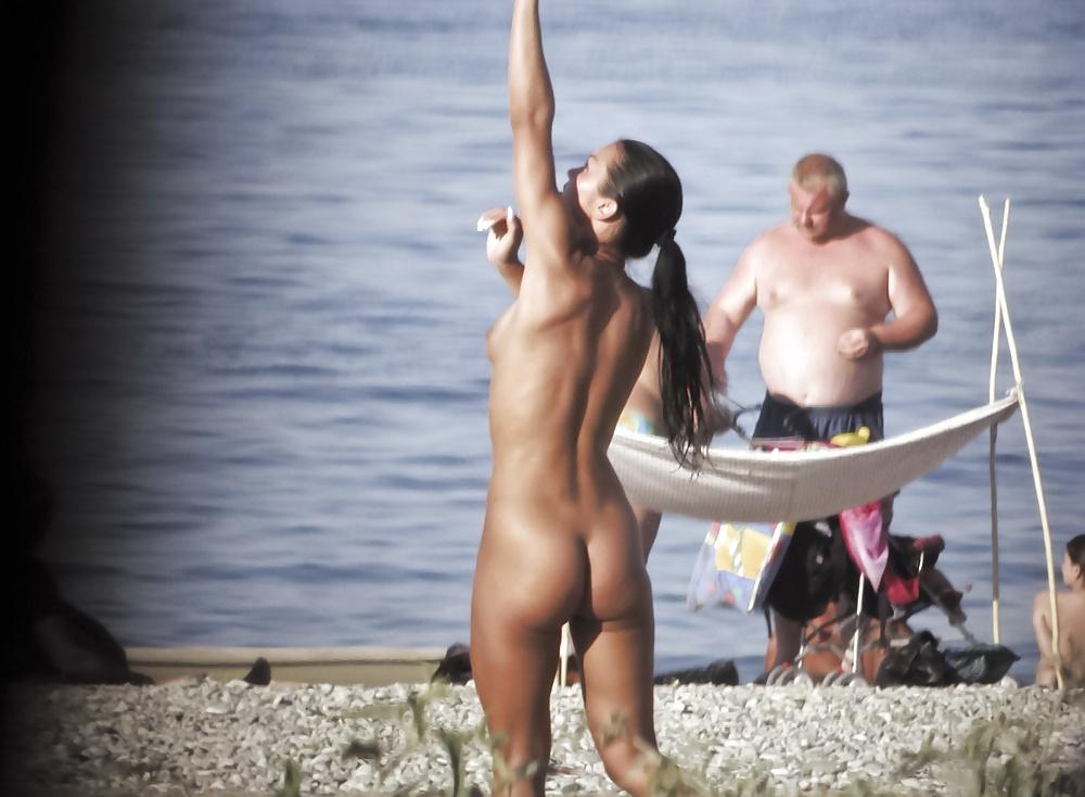 25P Nudist woman on beach