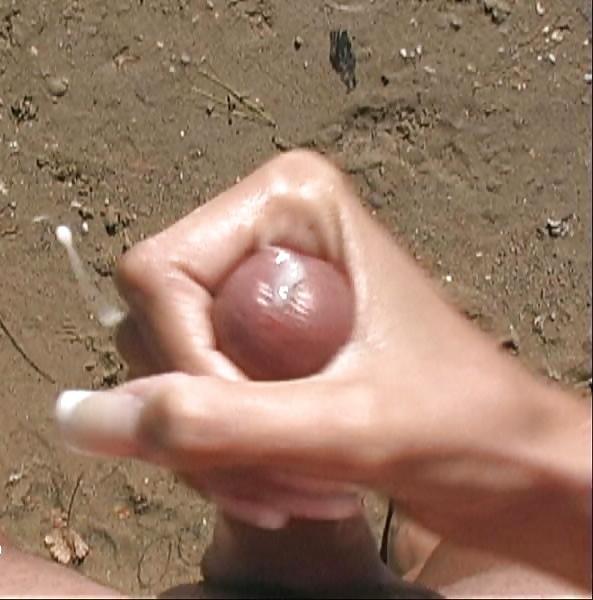 16P My Big Cum With My GF's Hand At The Beach