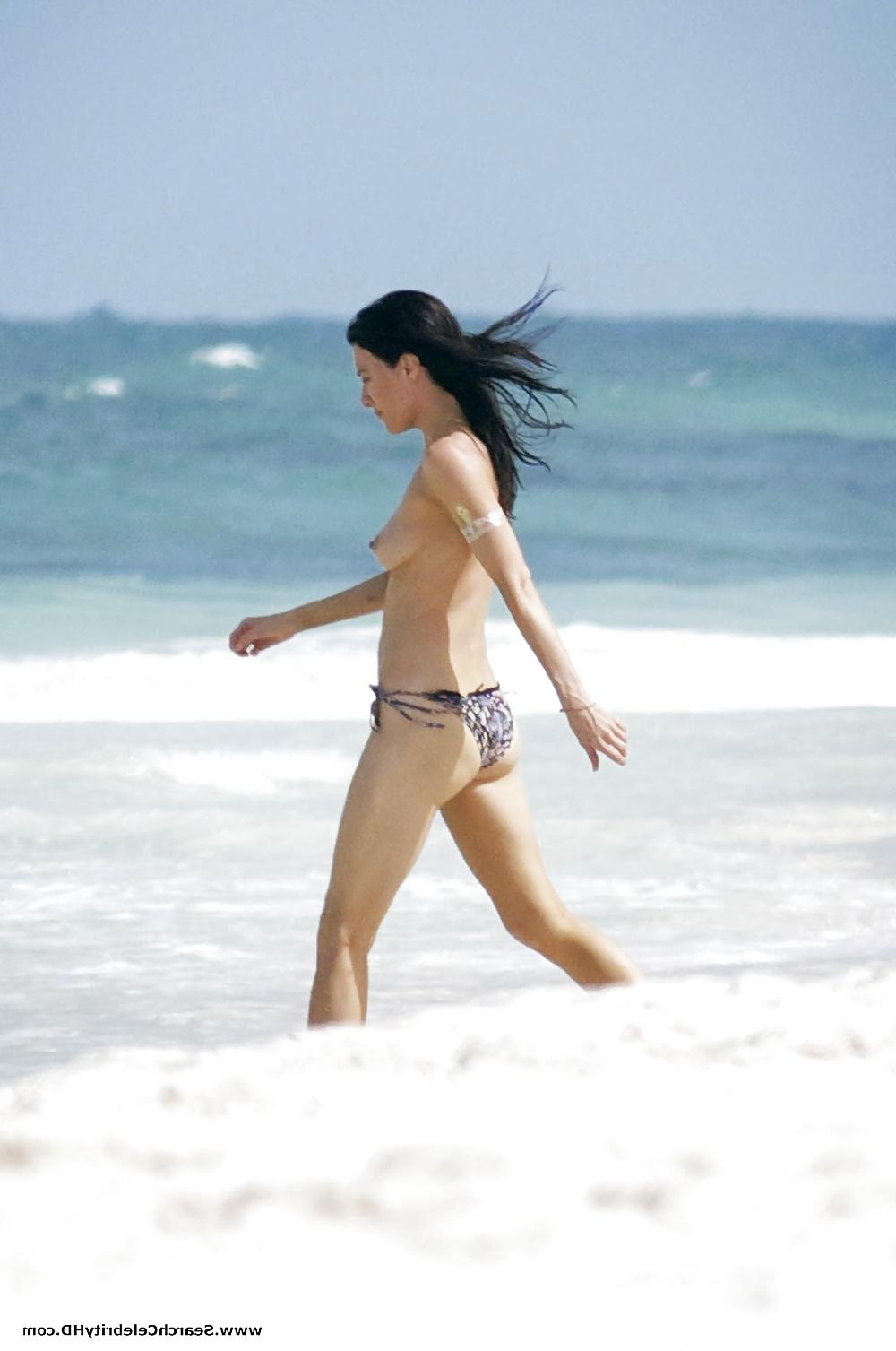 25P Jaime Murray Topless On The Beach in Mexico