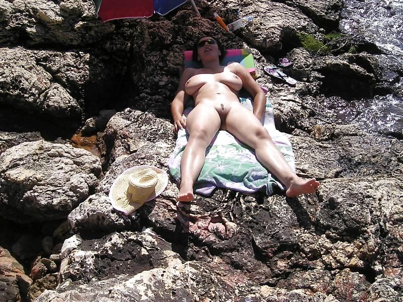 21P Busty beach milf