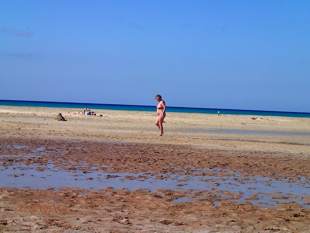 13P She loves to get naked at the beach....