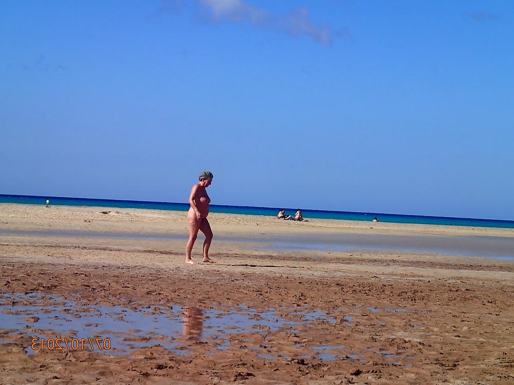 13P She loves to get naked at the beach....