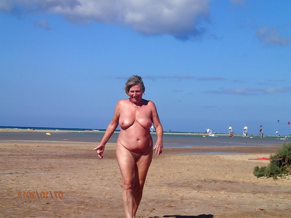 13P She loves to get naked at the beach....