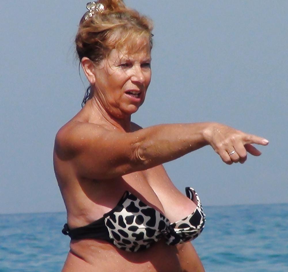 21P Candid Busty Beach Granny