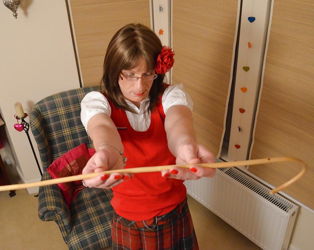5P TV Schoolgirl Miss Kimberley gets the cane.