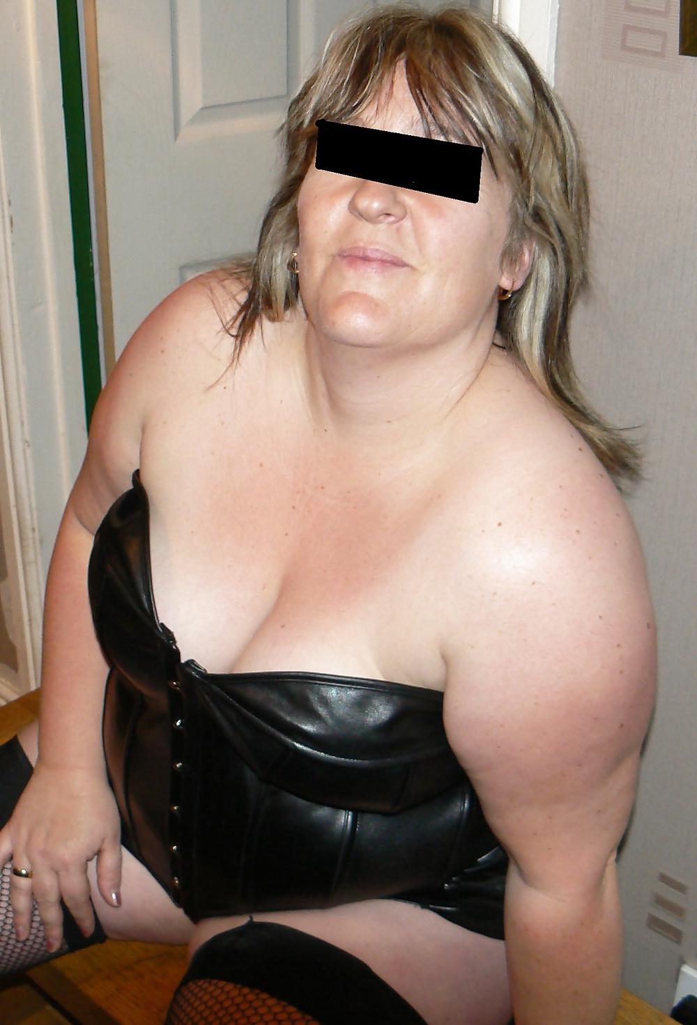 25P Naughtynursie black leather basque and very short skirt 