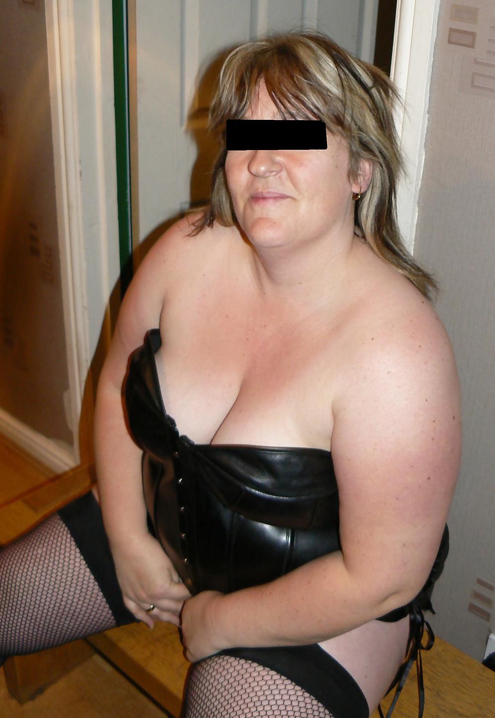 25P Naughtynursie black leather basque and very short skirt 