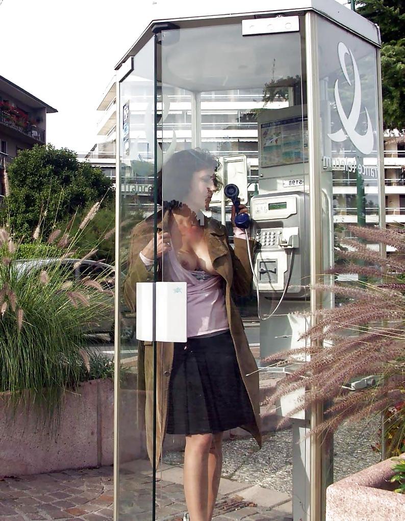 25P Flashing In A Phone Booth