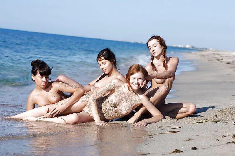 18P Four lesbians at the beach