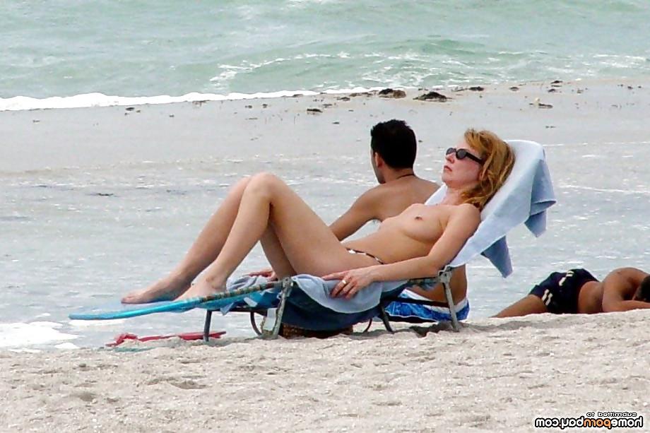 25P Hot beach girls teasing