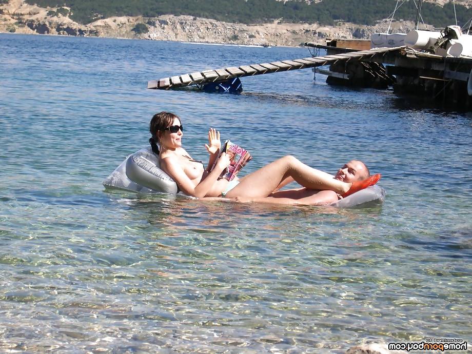 25P Topless girls on the beach