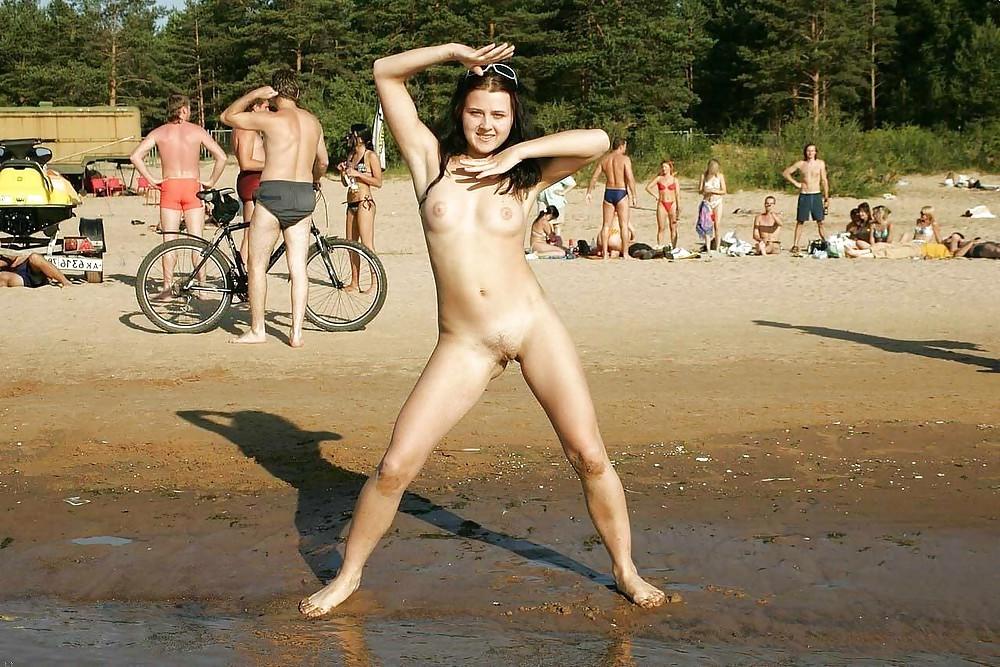14P Nudist gilrs spreading legs on beach. Voyeur.