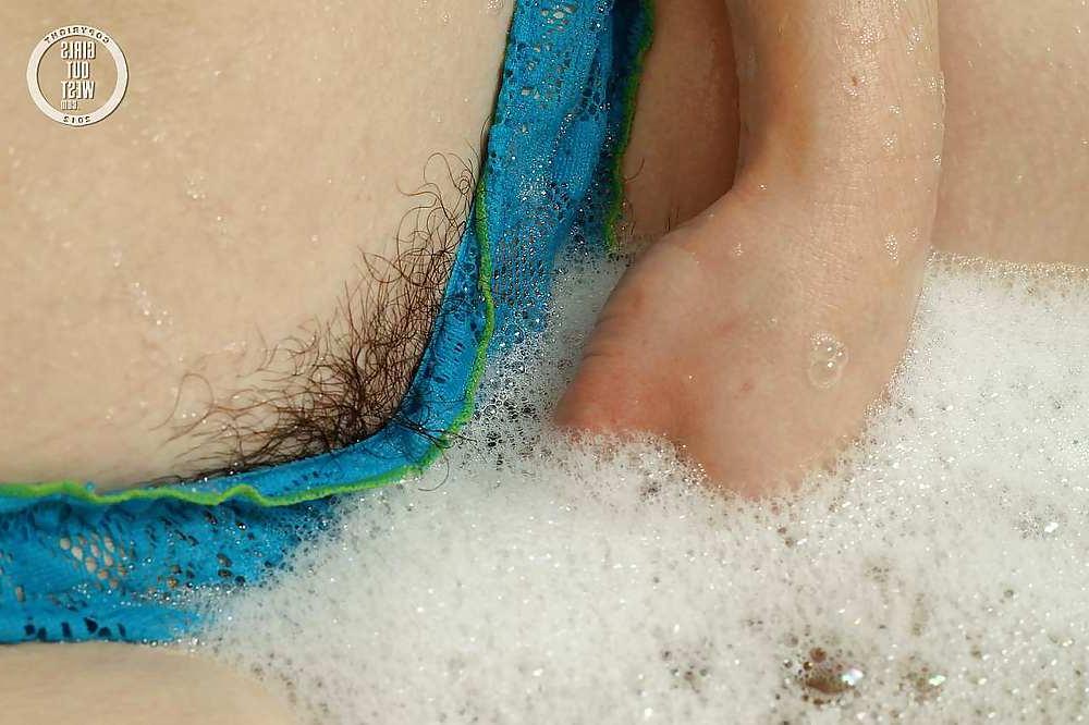 16P Amateur cutie toys her hairy pussy