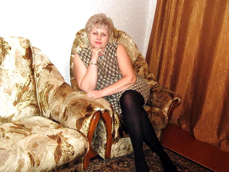 13P Russian mature woman with sexy legs!