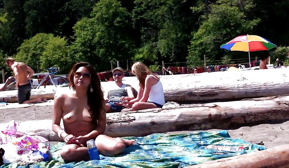 25P Naked on the public beach...