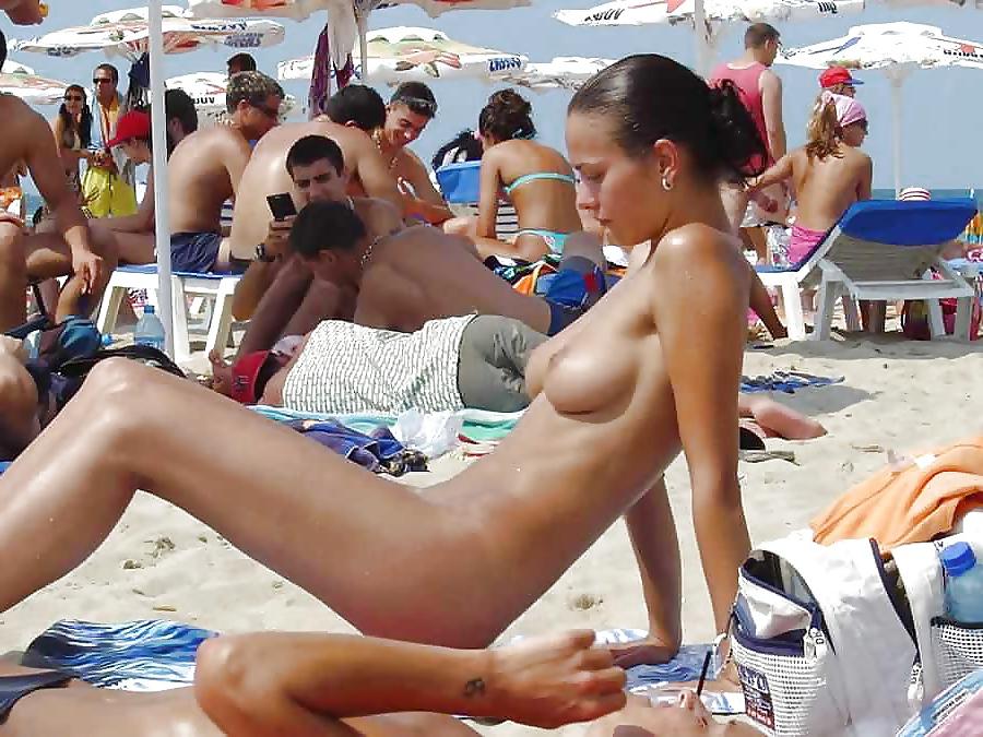 25P Naked on the public beach...