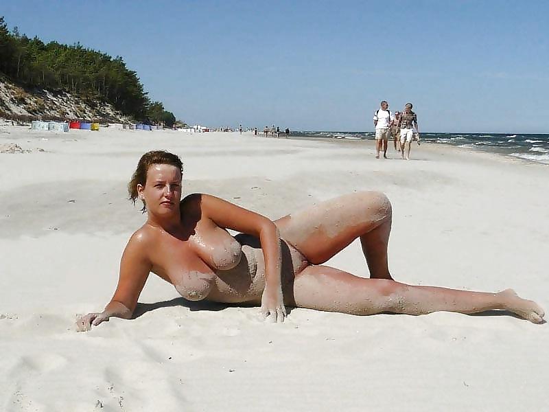 25P Naked on the public beach...
