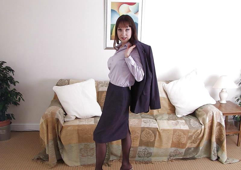 25P Young business lady undresses