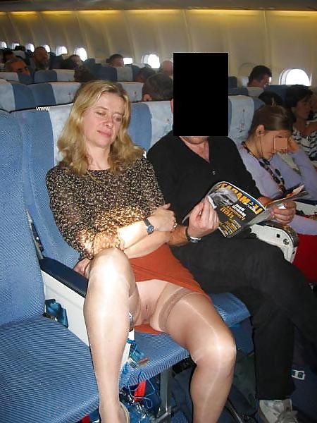 25P Women flashing stockings on public transport. 