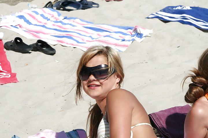 25P Teen girls on beach!