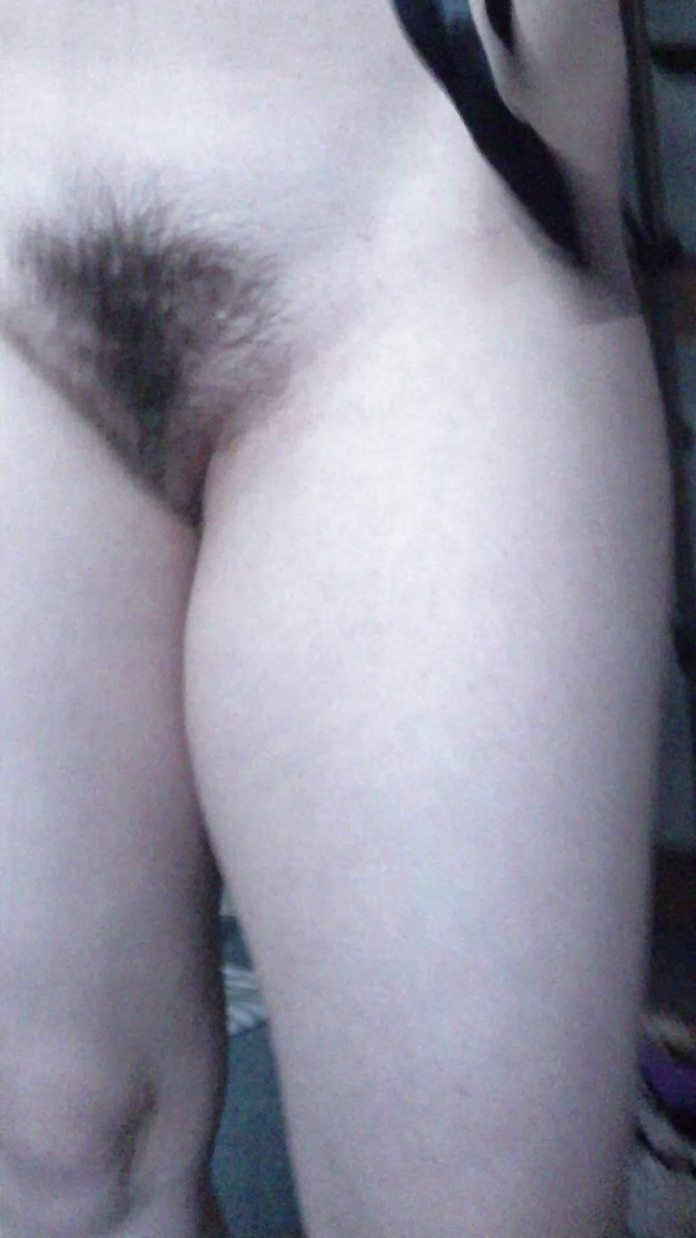 10P Sexy black string covers hairy pussy